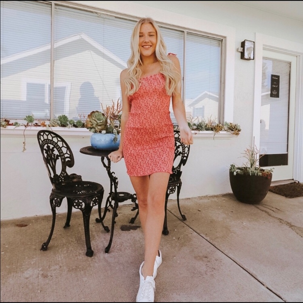 Smocked pink floral tie strap mini dress
